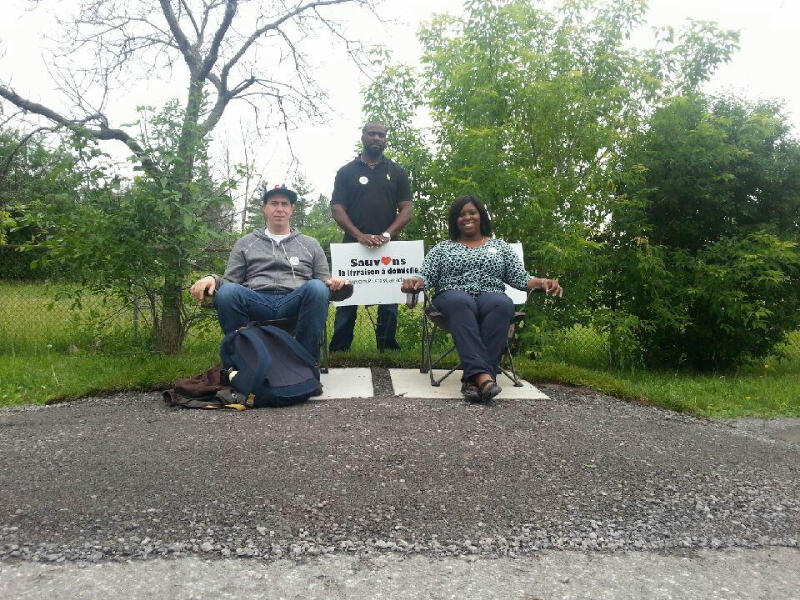 Members of the Canadian Union of Postal Workers occupy the mailbox site. Members of the Canadian Union of Postal Workers occupy the mailbox site.